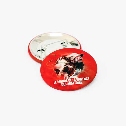 Badge "Libérons le monde de la violence des abattoirs"