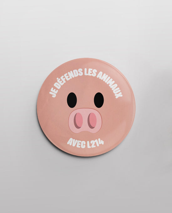 Badge "Je défends les animaux" - cochon portrait
